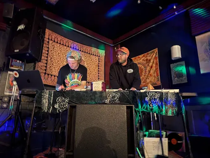 A live music performance inside the Floating Lotus taproom.